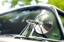 Rear view mirror of vintage car — Stock Photo