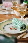 Close up shot of served table with empty plate and glass of wine — Stock Photo