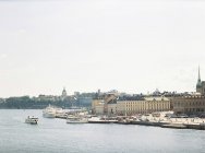 View of Stockholm harbor with old town buildings — Stock Photo