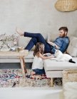Father and baby girl in living room — Stock Photo