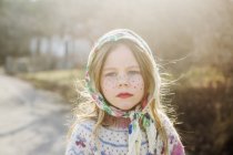 Portrait of girl dressed up as Easter witch wearing headscarf — Stock Photo