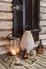 Front view of wooden patio with candles and lanterns — Stock Photo