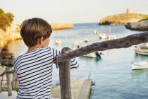 Boy looking at seaside view at Menorca, Spain — Stock Photo