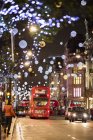 Christmas decorations in London at night — Stock Photo