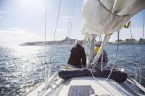 Senior men sailing in bay, selective focus — Stock Photo
