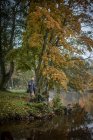 Man fishing in river, selective focus — Stock Photo