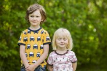 Portrait of siblings outdoors, selective focus — Stock Photo