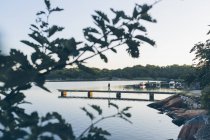 Scenic view of pier at river, selective focus — Stock Photo