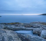 Eroded rock formations on coastline at stockholm archipelago — Stock Photo