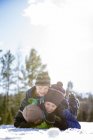 Brothers playing at winter, selective focus — Stock Photo