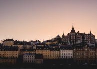Front view of buildings exterior at sunrise in Stockholm — Stock Photo