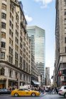 Street and skyscrapers in New York City — Stock Photo