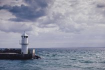 Scenic view of lighthouse by sea, northern europe — Stock Photo