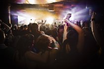 People dancing at concert, selective focus — Stock Photo