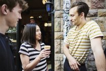 Friends drinking beer near bar, selective focus — Stock Photo