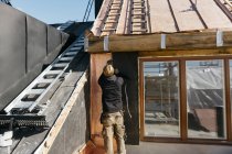 Roofer working on building in Stockholm, Sweden — Stock Photo