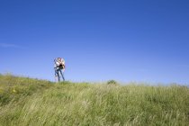 Mother and son taking selfie on hill in Kullaberg, Sweden — Stock Photo
