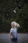 Girl standing outdoors in Ornahusen, Sweden — Stock Photo