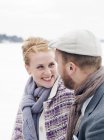 Young couple smiling and looking at each other — Stock Photo
