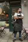 Small business owner outside cafe, selective focus — Stock Photo