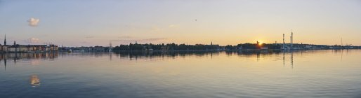 Panorama of skyline by sea at sunset in Stockholm, Sweden — Stock Photo