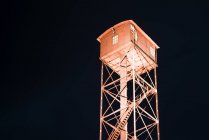 Low angle view of guard tower at night — Stock Photo