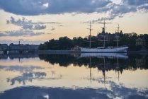 Sailboat af Chapman moored at sunset in Stockholm, Sweden — Stock Photo