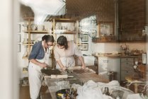 Women in pottery workshop, selective focus — Stock Photo