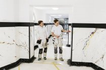 Painters in apartment hallway, selective focus — Stock Photo