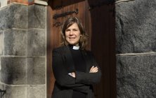 Portrait of priest outside church, selective focus — Stock Photo
