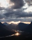 Mountains under clouds at sunset in Rapa Valley, Sweden — Stock Photo