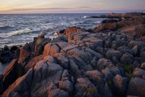 Scenic view of Rocks by sea — Stock Photo
