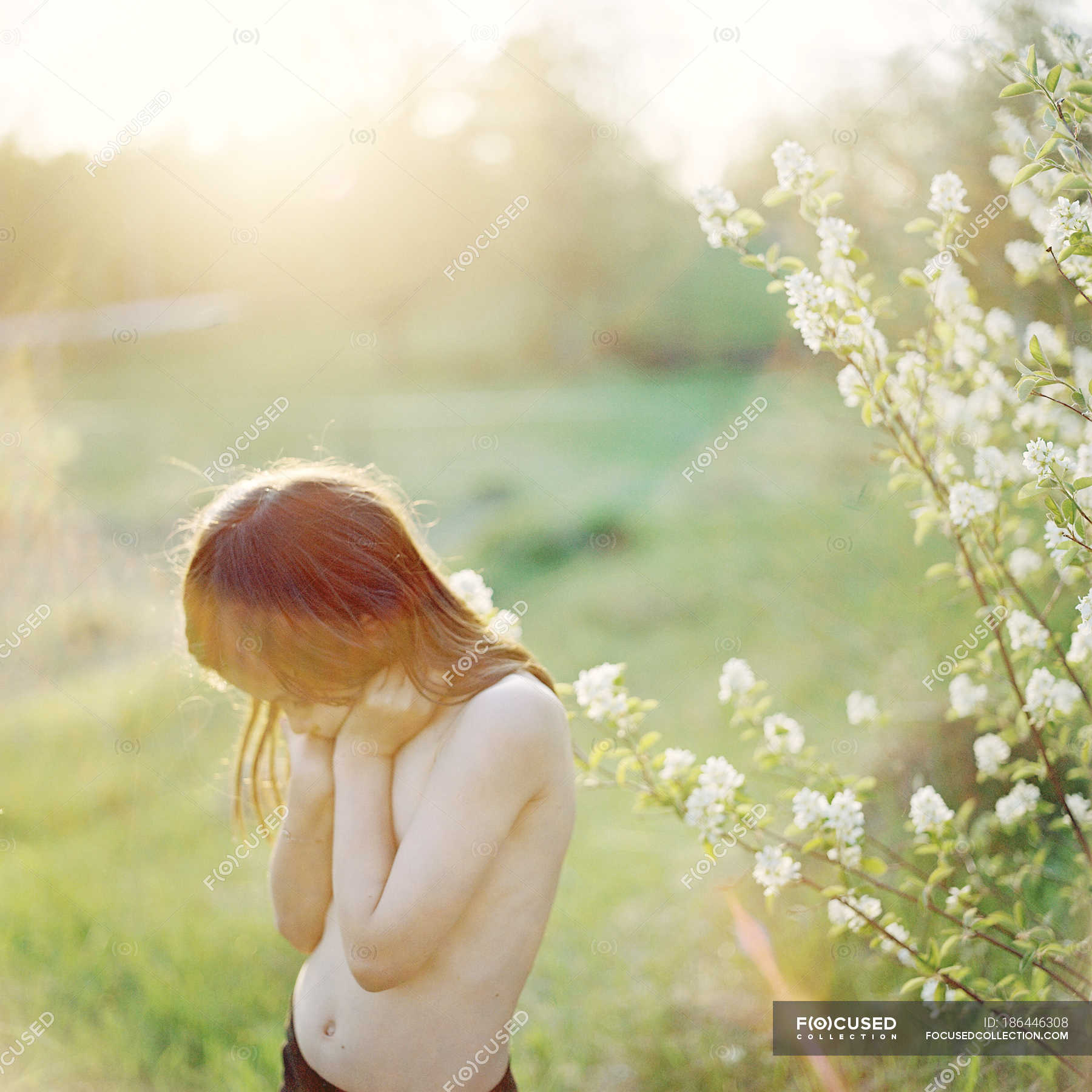 Front View Of Shirtless Girl Outdoors In Summer — Brown Hair Sunny