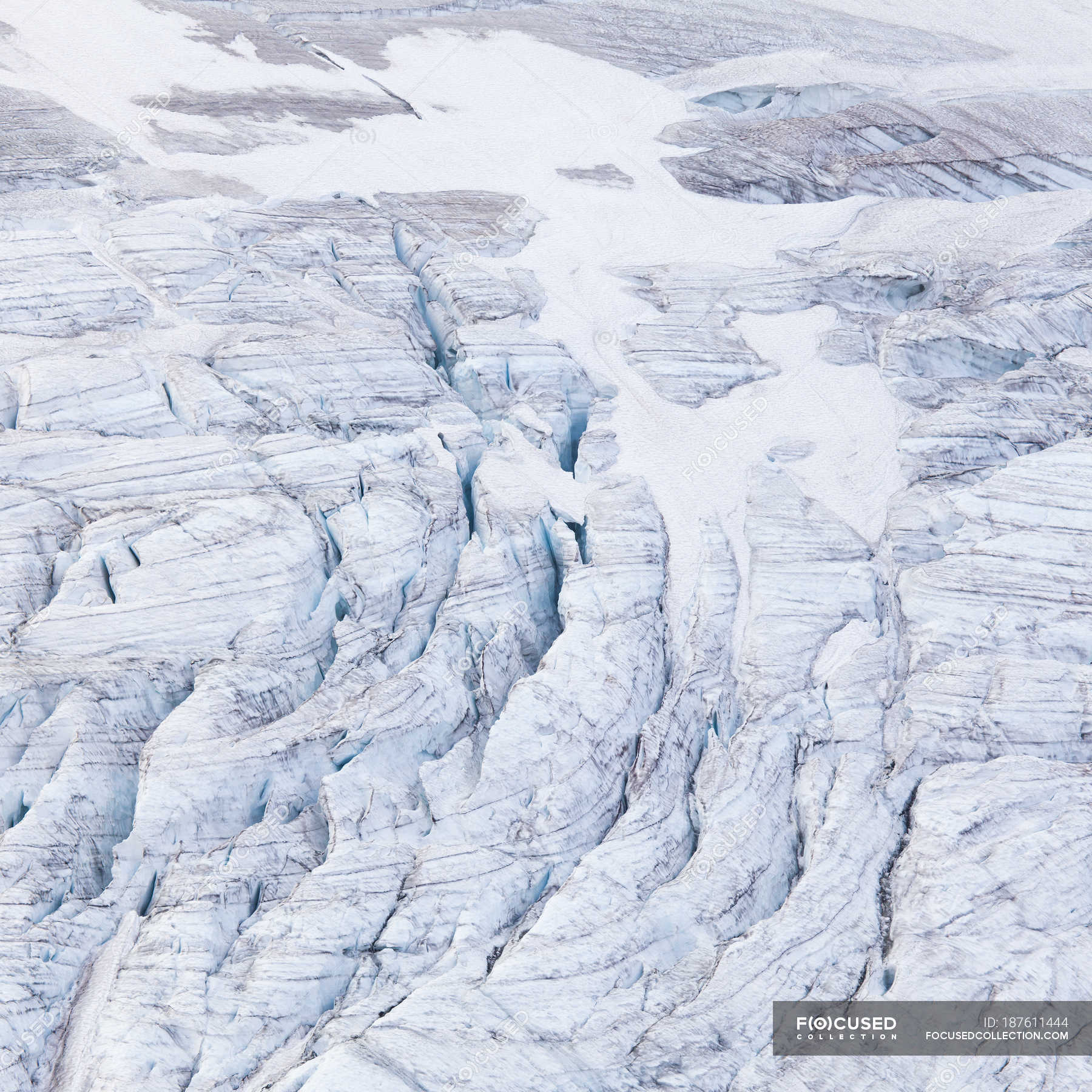 Aerial view of glacier with snowy areas — frozen, daylight - Stock ...