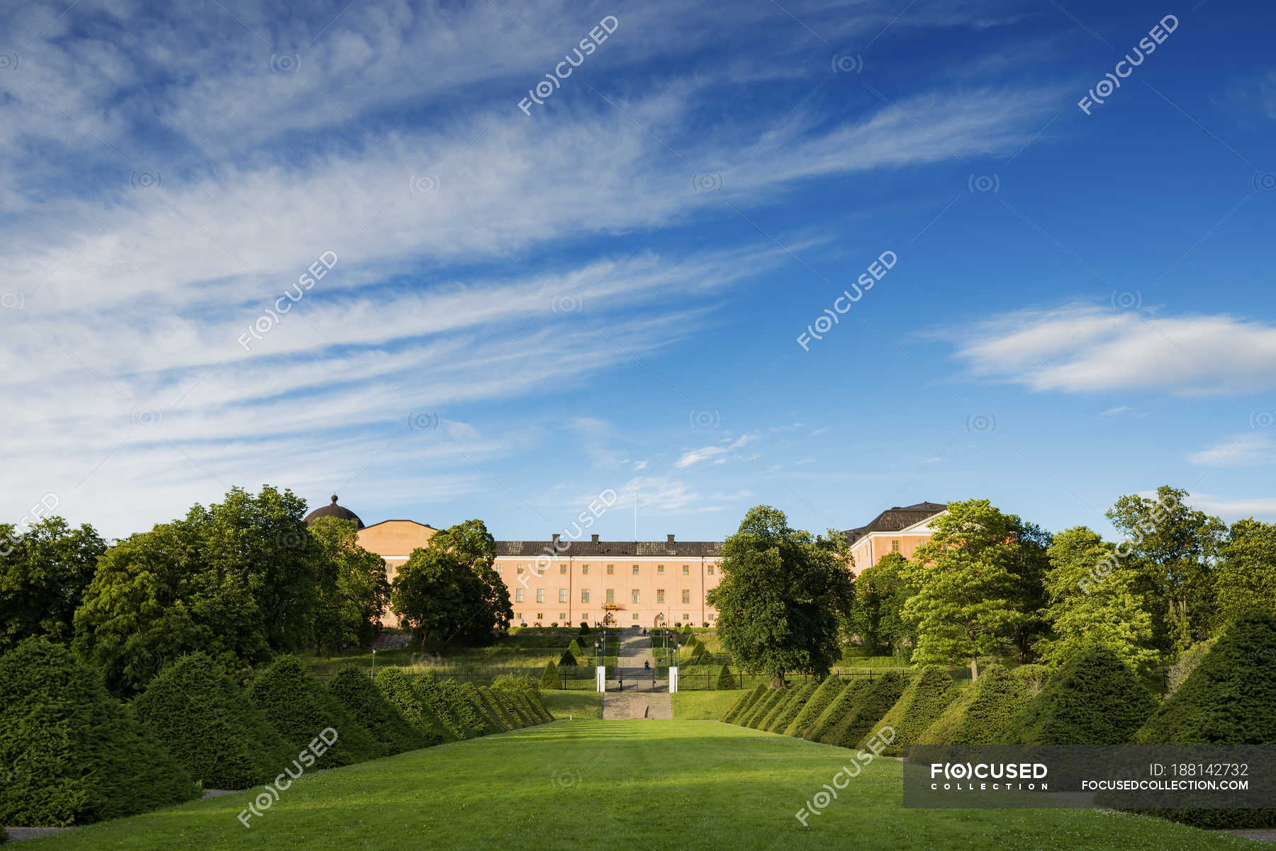 Building and green lawn in Linnaean Garden, Uppsala, Sweden — daytime