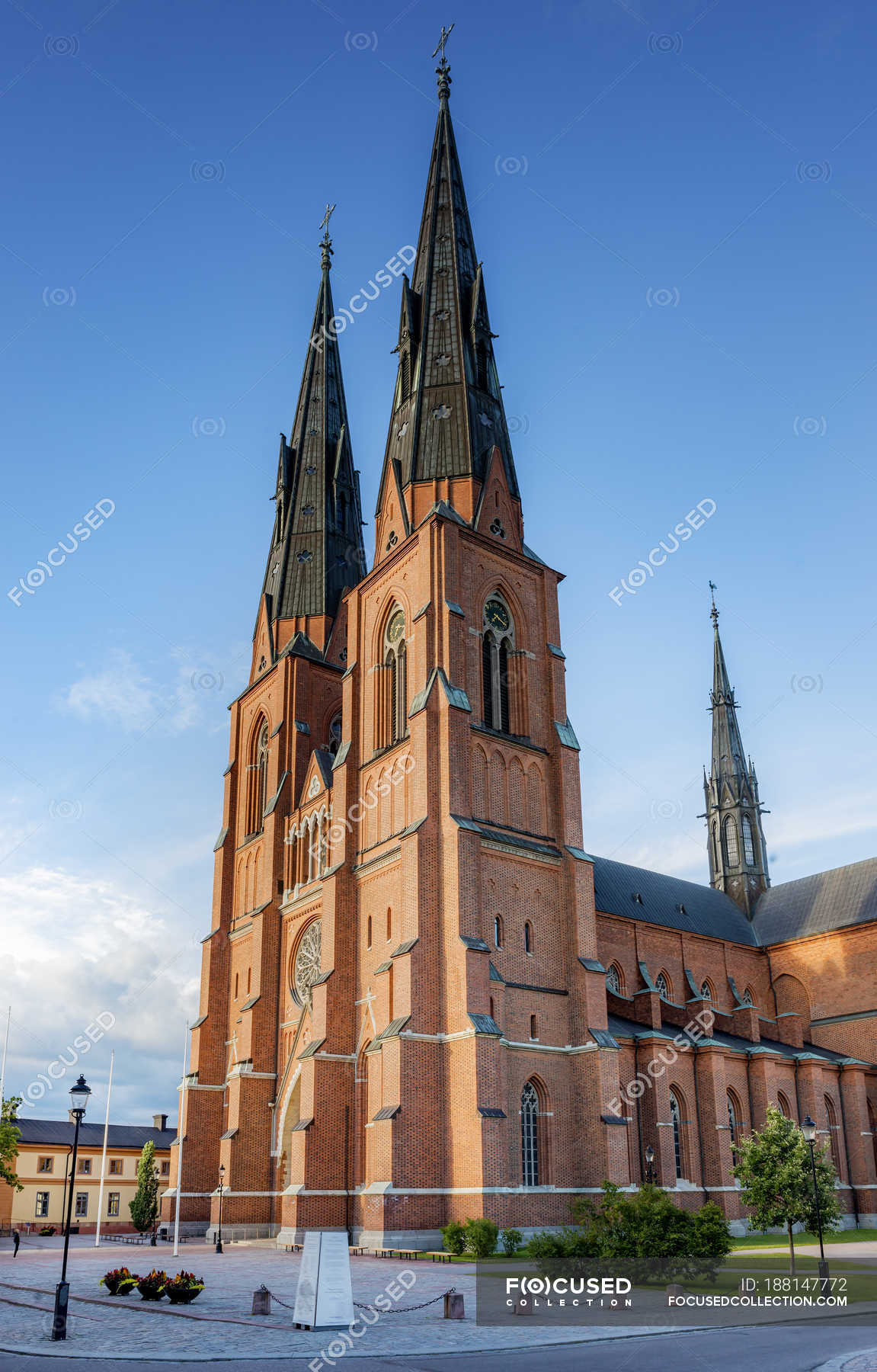 Sun Lighted Uppsala Cathedral Under Blue Sky — Towers, Spiritual 