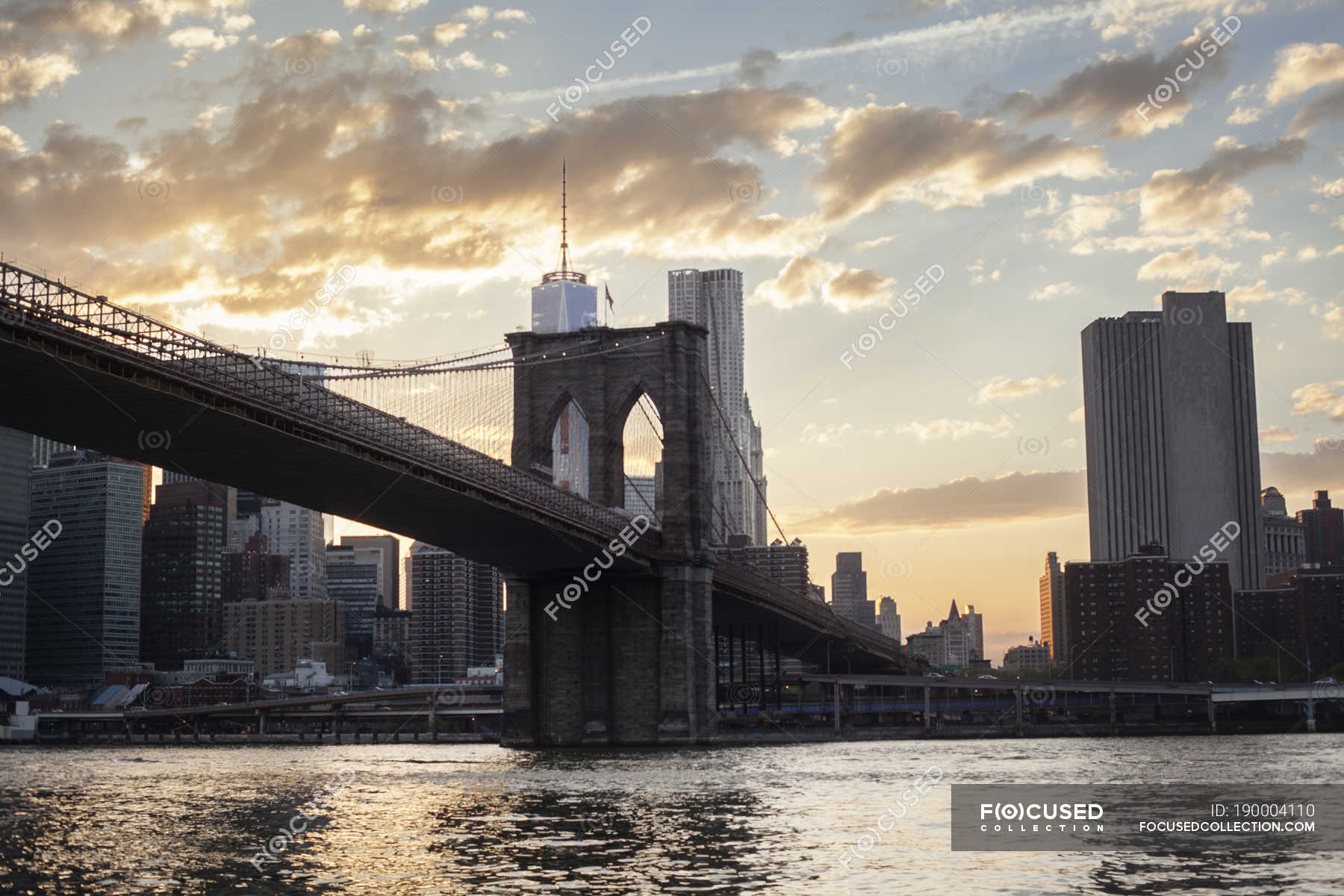 Brooklyn Bridge In New York City Against Sky With Clouds — Buildings ...