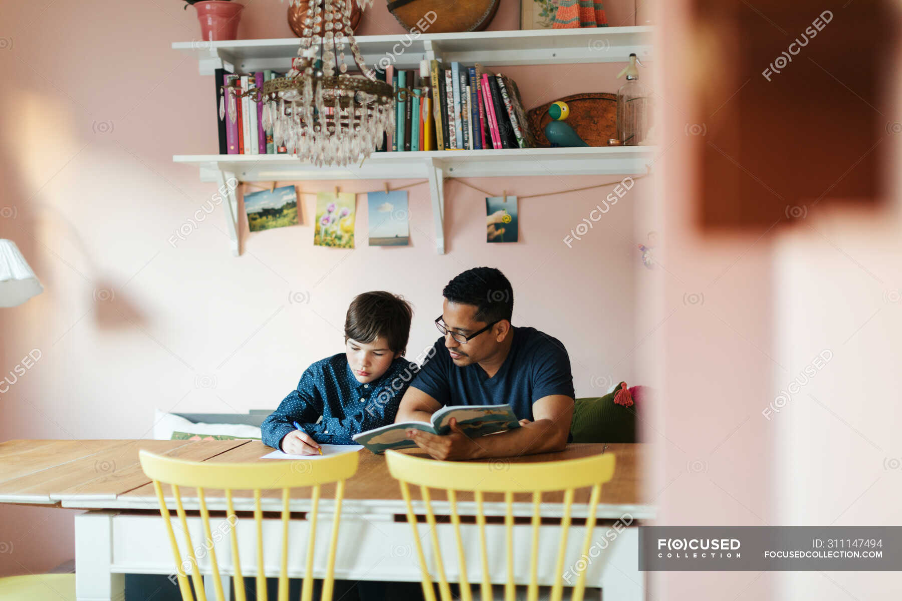 father helping with homework