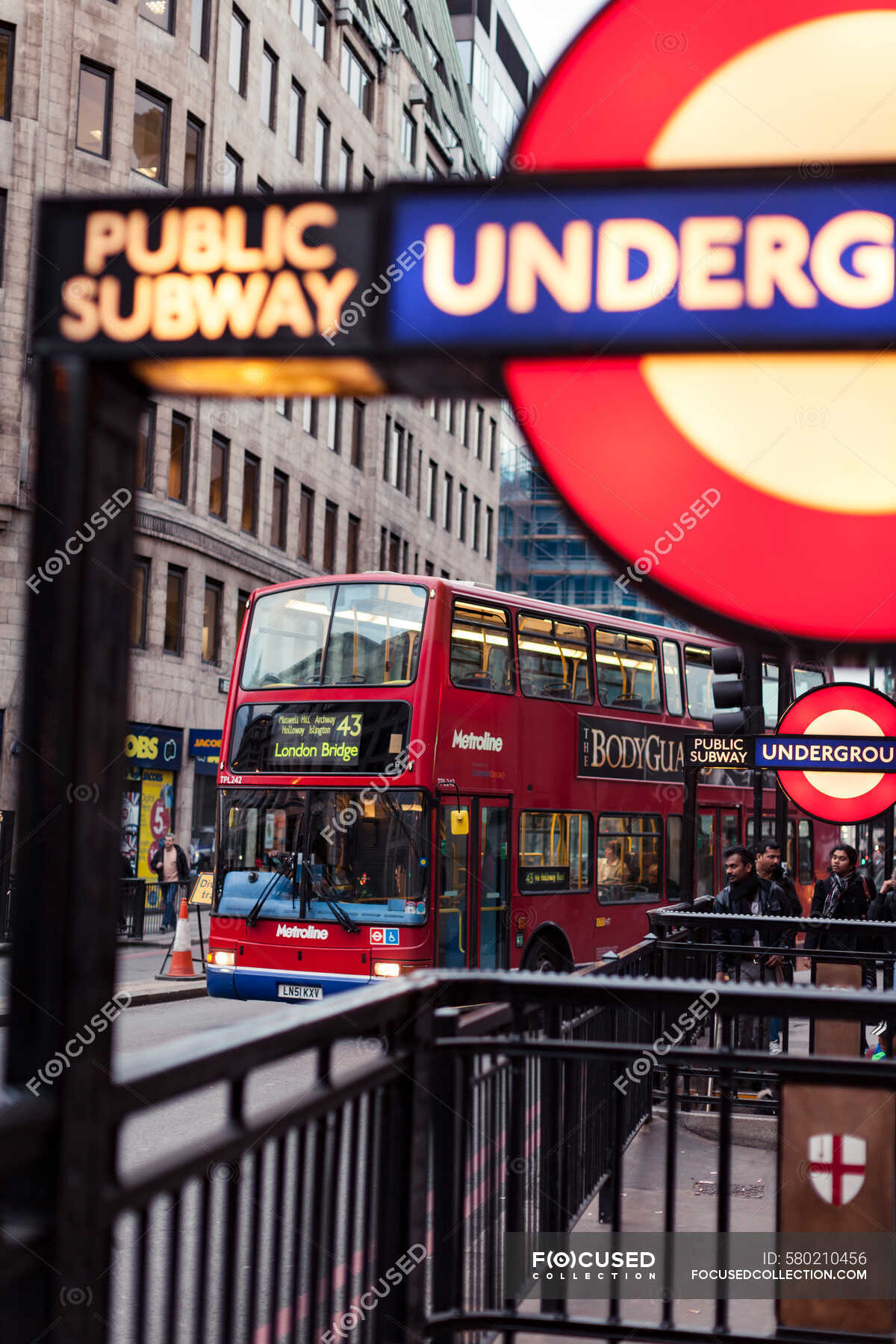 london-underground-sign-and-double-decker-bus-on-streets-of-london