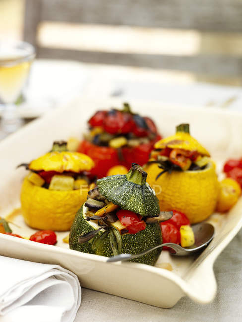 Close-up of stuffed, baked peppers and squash — Stock Photo