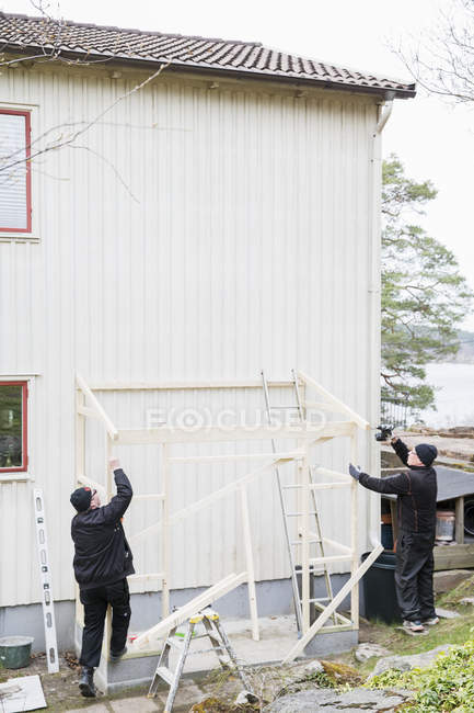 Senior men renovating house, selective focus — Stock Photo