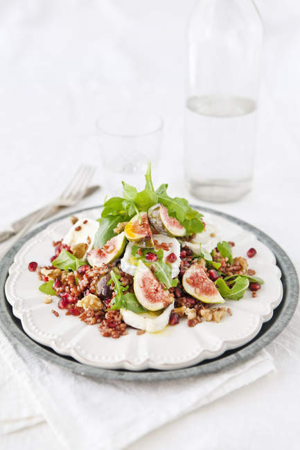 Portion of fig salad served on table — Stock Photo