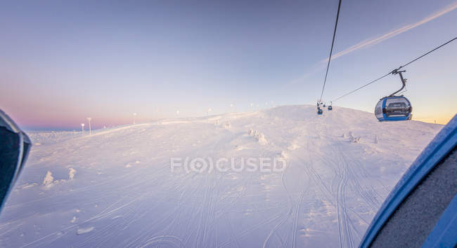 View of snow covered landscape with cableway — Stock Photo