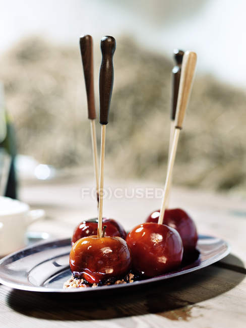 Chocolate dipped cherries served on tray, close up shot — Stock Photo