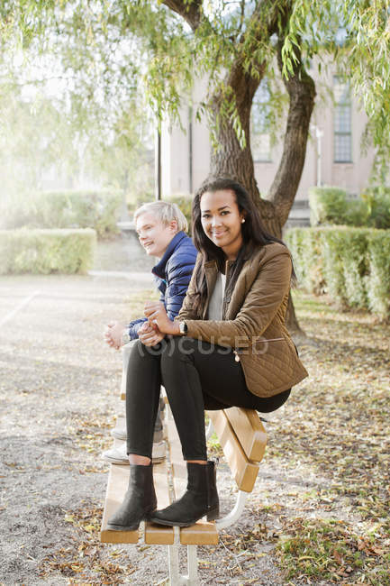 Front view of teenage friends in park — Stock Photo