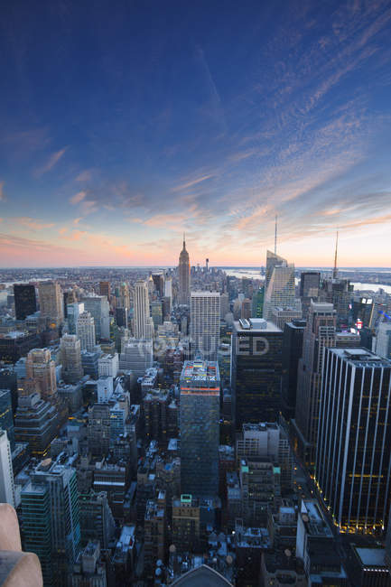 New York City skyscrapers under sunset sky — Stock Photo