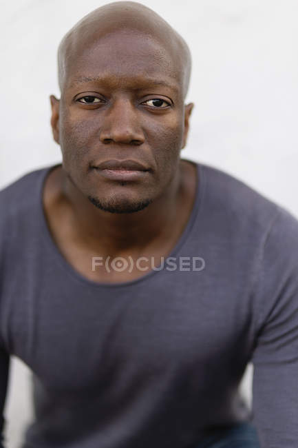 Studio portrait of mid adult man on white background — Stock Photo