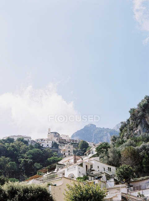 Italian townscape against cloudy sky — Stock Photo