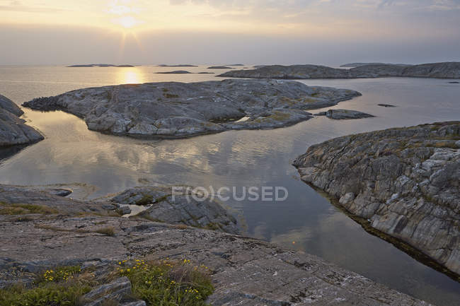 View of archipelago rocks and islands at sunset — Stock Photo