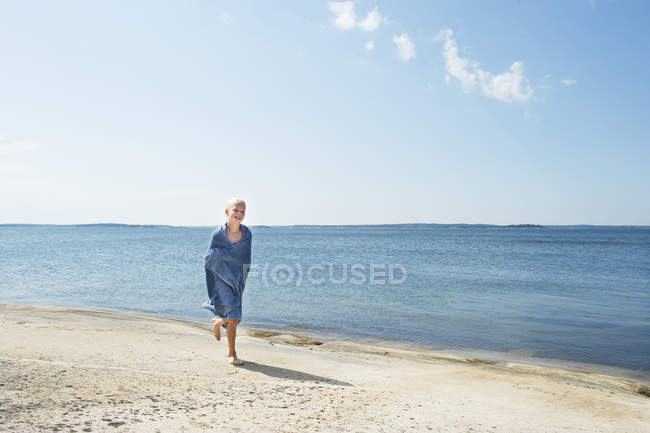 Portrait of girl wrapped in towel, selective focus — Stock Photo